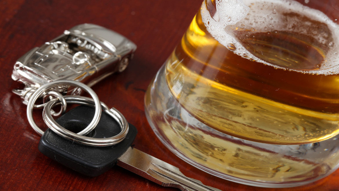 car keys and a glass of beer