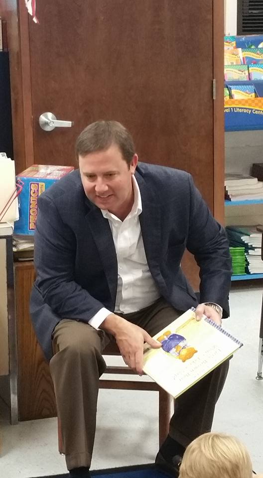 Representative Jason Shaw reading to a first-grade class in Lanier County