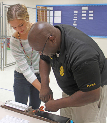 A student being fingerprinted while participating in the Tift County Teen Maze. Photo by Latasha Ford